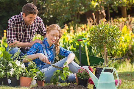 Happy young couple gardening together Stock Photo - Premium Royalty-Free, Code: 6109-08203095