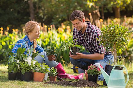 Young couple gardening together Stock Photo - Premium Royalty-Free, Code: 6109-08203100