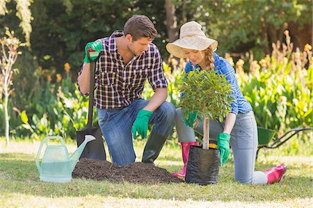 Young couple gardening together Stock Photo - Premium Royalty-Free, Code: 6109-08203111