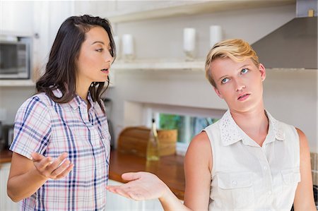simsearch:6109-07601529,k - Angry lesbian couple facing a dispute Stock Photo - Premium Royalty-Free, Code: 6109-08203540
