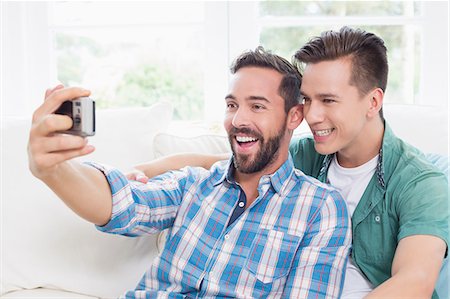 Homosexual couple men taking a selfie Stock Photo - Premium Royalty-Free, Code: 6109-08203570