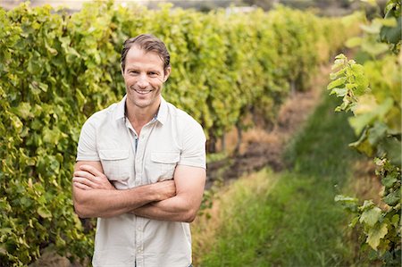 simsearch:6109-08204218,k - Happy vintner with crossed arms Stock Photo - Premium Royalty-Free, Code: 6109-08204228