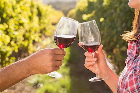 simsearch:6109-08204218,k - Couple toasting with red wine Stock Photo - Premium Royalty-Free, Code: 6109-08204353