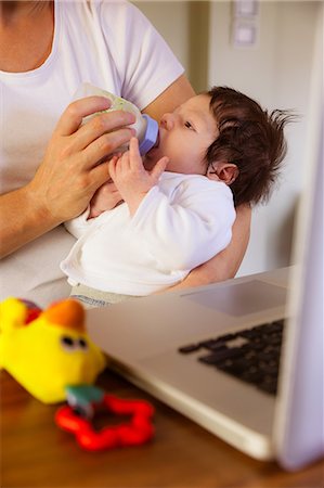 simsearch:6109-08390041,k - Newborn being fed by the mother Stock Photo - Premium Royalty-Free, Code: 6109-08390042