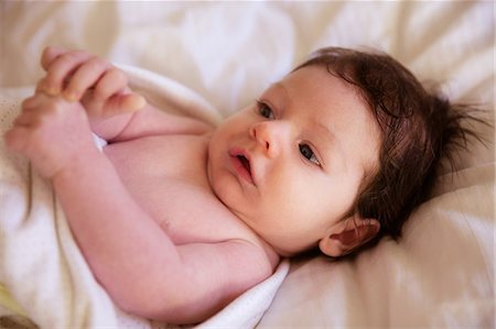 simsearch:6109-08390041,k - Newborn on changing table Stock Photo - Premium Royalty-Free, Code: 6109-08390016