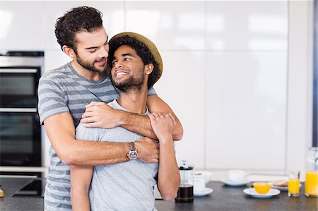 simsearch:6109-08390293,k - Happy gay couple hugging Stock Photo - Premium Royalty-Free, Code: 6109-08390243