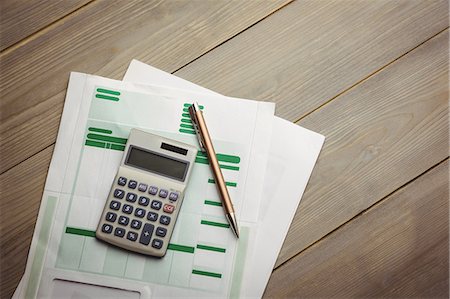 simsearch:6109-08395080,k - High angle view of calculator with documents Stock Photo - Premium Royalty-Free, Code: 6109-08395103