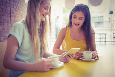 Students chatting in the cafe Stock Photo - Premium Royalty-Free, Code: 6109-08395908