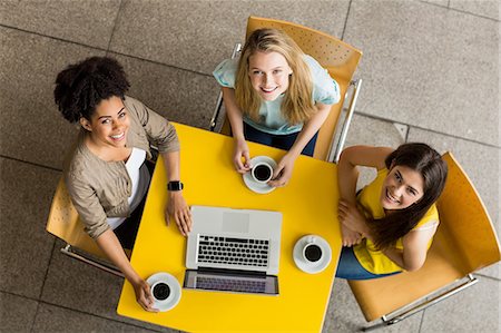 photos of mixed race teenage girls - Students using laptop in the cafe Stock Photo - Premium Royalty-Free, Code: 6109-08395914