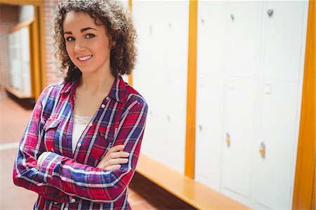 Pretty student smiling at camera Stock Photo - Premium Royalty-Free, Code: 6109-08396323