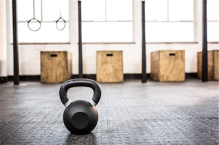 simsearch:6109-08397716,k - Black kettlebell in the studio Stock Photo - Premium Royalty-Free, Code: 6109-08397712