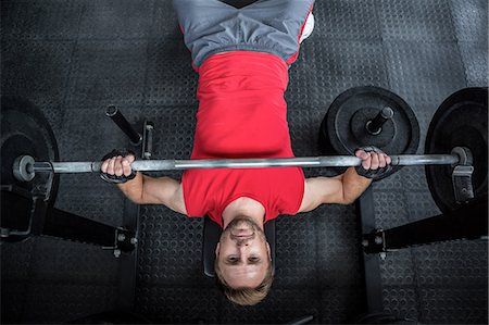 simsearch:6109-08397871,k - Fit man lifting heavy barbell Stock Photo - Premium Royalty-Free, Code: 6109-08397840