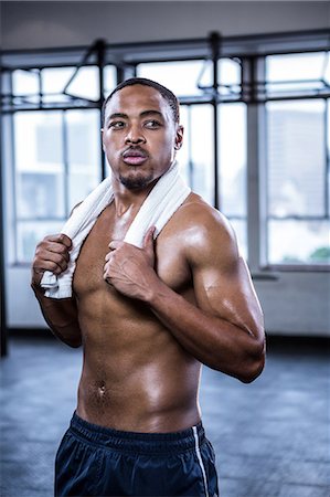 simsearch:6109-08397871,k - Fit shirtless man with towel on shoulders Stock Photo - Premium Royalty-Free, Code: 6109-08398122