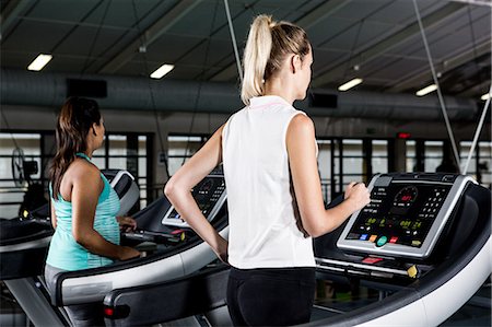 simsearch:6109-08398593,k - Women on treadmills Stock Photo - Premium Royalty-Free, Code: 6109-08398590