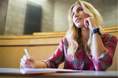 simsearch:649-06041393,k - Thoughtful female student during class Stock Photo - Premium Royalty-Free, Code: 6109-08398906