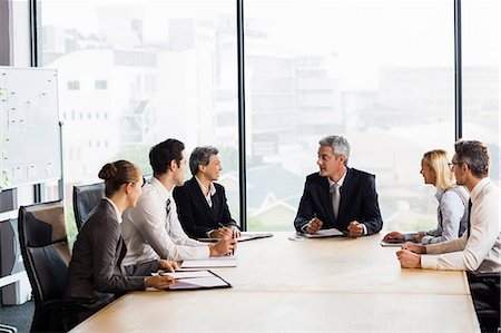 Business team having a meeting at the office Stock Photo - Premium Royalty-Free, Code: 6109-08488782