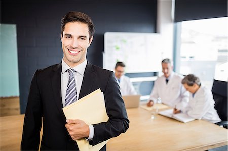 Medical team having a meeting at the office Stock Photo - Premium Royalty-Free, Code: 6109-08488876