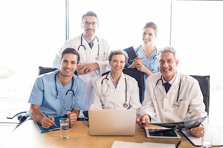 simsearch:6109-06005907,k - Medical team having a meeting at the hospital Stock Photo - Premium Royalty-Free, Code: 6109-08488902