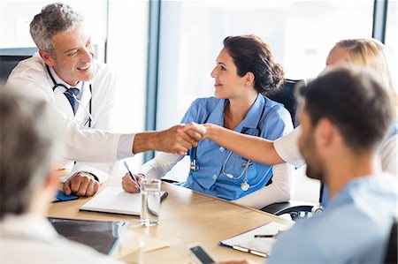 simsearch:640-03262464,k - Medical team having a meeting at the hospital Stock Photo - Premium Royalty-Free, Code: 6109-08488933