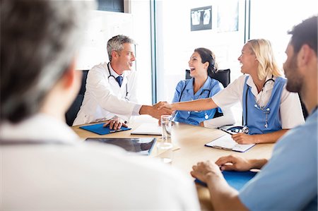 simsearch:640-03262464,k - Medical team having a meeting at the hospital Stock Photo - Premium Royalty-Free, Code: 6109-08488932