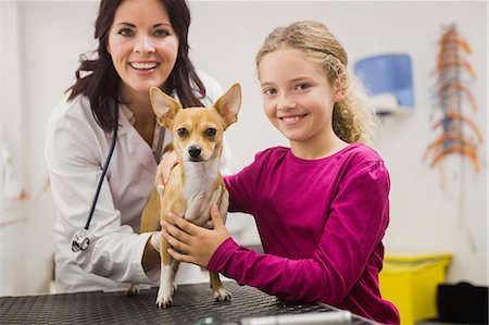 simsearch:6109-08537861,k - Portrait of veterinarian and girl with dog Stock Photo - Premium Royalty-Free, Code: 6109-08536650