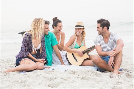 simsearch:6109-06781569,k - Group of friends playing the guitar Stock Photo - Premium Royalty-Free, Code: 6109-08536860
