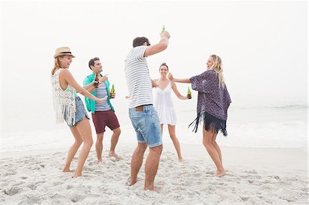 Group of friends having a party Stock Photo - Premium Royalty-Free, Code: 6109-08536870