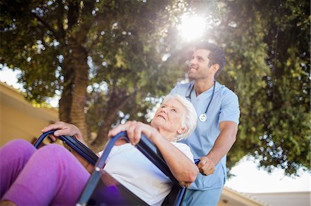 elderly poses - Nurse posing with a senior woman Stock Photo - Premium Royalty-Free, Code: 6109-08538428