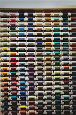 simsearch:6109-08701535,k - Colorful spools of thread in the box Stock Photo - Premium Royalty-Free, Code: 6109-08701542