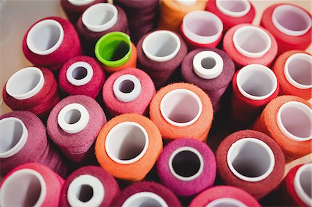 simsearch:6109-08701535,k - Colorful spools of thread in the box Stock Photo - Premium Royalty-Free, Code: 6109-08701536