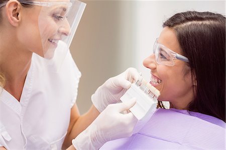 simsearch:6109-08804015,k - Dermatologist and female patient discussing on digital tablet in clinic Stock Photo - Premium Royalty-Free, Code: 6109-08803918