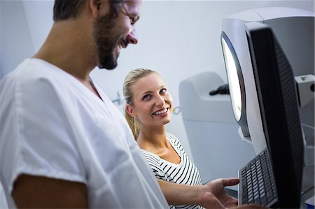 scanner - Woman discussing with dermatologist in clinic Stock Photo - Premium Royalty-Free, Code: 6109-08804110