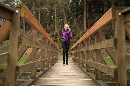 simsearch:400-04535435,k - Beautiful woman jogging in forest Stock Photo - Premium Royalty-Free, Code: 6109-08953850