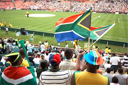 people in johannesburg - Soccer fans at match Stock Photo - Premium Royalty-Free, Code: 6110-07233637