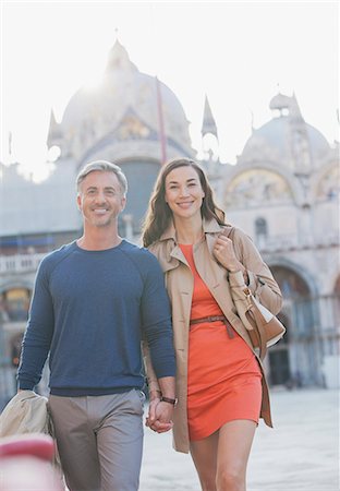 simsearch:6113-06498180,k - Portrait of smiling couple in St. Mark's Square in Venice Stock Photo - Premium Royalty-Free, Code: 6113-06498187