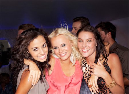 partier - Portrait of smiling women in nightclub Stock Photo - Premium Royalty-Free, Code: 6113-06498680