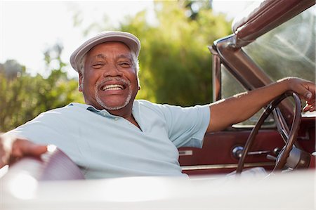 people in vintage convertibles - Smiling older man driving convertible Stock Photo - Premium Royalty-Free, Code: 6113-06498968