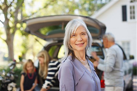 Older woman smiling outdoors Stock Photo - Premium Royalty-Free, Code: 6113-06498970