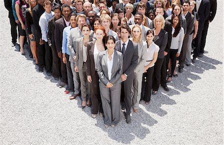 simsearch:6113-06499188,k - Portrait of business people forming triangle Stock Photo - Premium Royalty-Free, Code: 6113-06499155