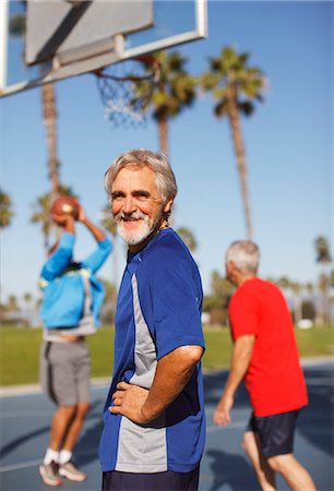 senior sports - Older man playing basketball on court Stock Photo - Premium Royalty-Free, Code: 6113-06499115