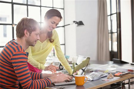 small business computers - Couple working on laptop together Stock Photo - Premium Royalty-Free, Code: 6113-06625625