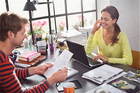 people home office not shopping - Couple working together at desk Stock Photo - Premium Royalty-Free, Code: 6113-06625628