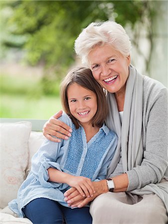simsearch:649-03858052,k - Woman and granddaughter smiling on porch swing Stock Photo - Premium Royalty-Free, Code: 6113-06626403