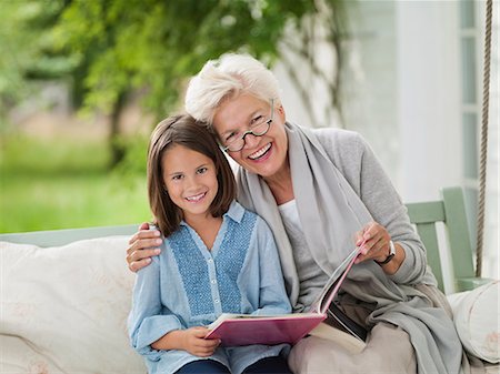 simsearch:649-03858052,k - Woman and granddaughter smiling in porch swing Stock Photo - Premium Royalty-Free, Code: 6113-06626418