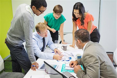 simsearch:6113-07159049,k - Business people talking in meeting Stock Photo - Premium Royalty-Free, Code: 6113-06753571