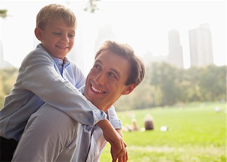 simsearch:6113-06899473,k - Father and son in urban park Stock Photo - Premium Royalty-Free, Code: 6113-06720428
