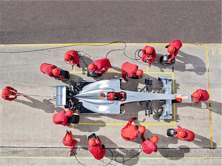 Racing team working at pit stop Stock Photo - Premium Royalty-Free, Code: 6113-06720847