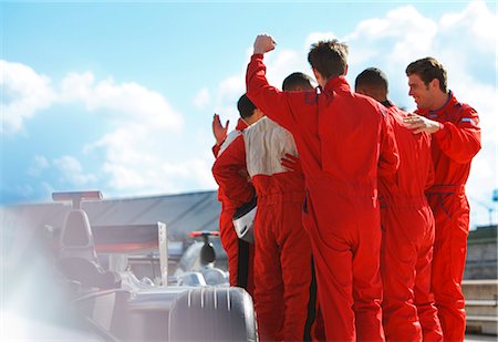 performance - Racer and team cheering on track Stock Photo - Premium Royalty-Free, Code: 6113-06720854