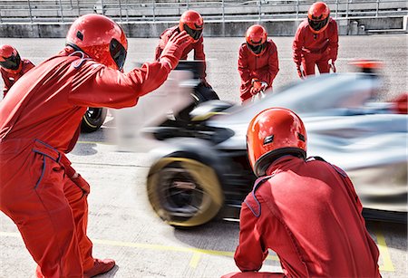 race track (people) - Racing team working at pit stop Stock Photo - Premium Royalty-Free, Code: 6113-06720800