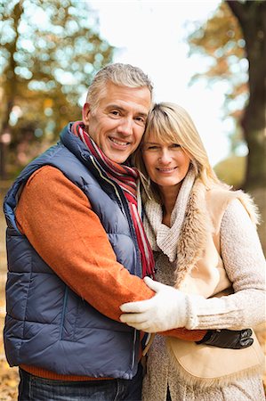 simsearch:6113-07242393,k - Older couple hugging in park Stock Photo - Premium Royalty-Free, Code: 6113-06721261